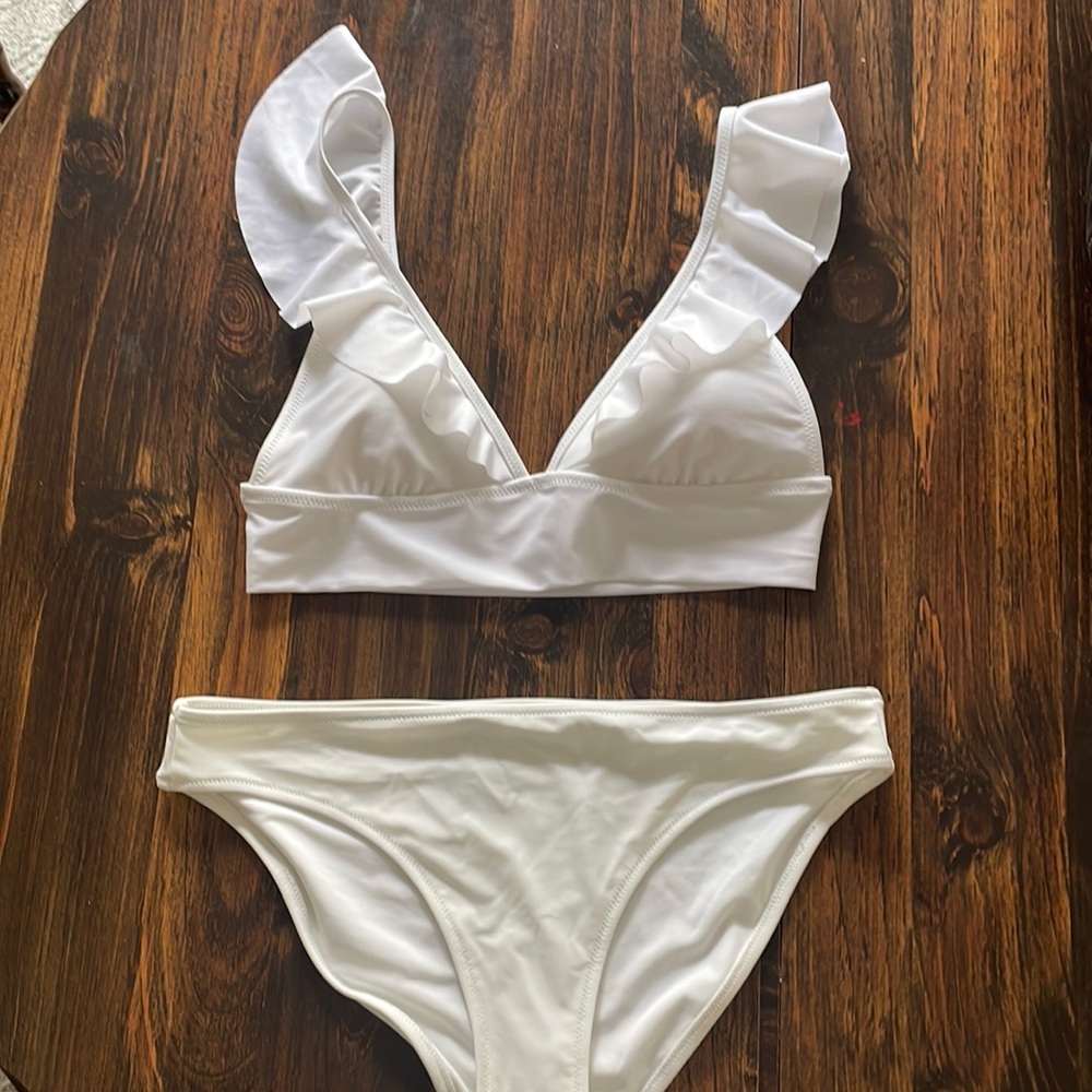 White, aerie bikini. Top worn once. Bottoms, never worn, new with tags.